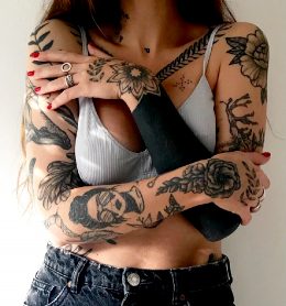 Inked Girl And Tattoo Artist © Svitlana Livshits.