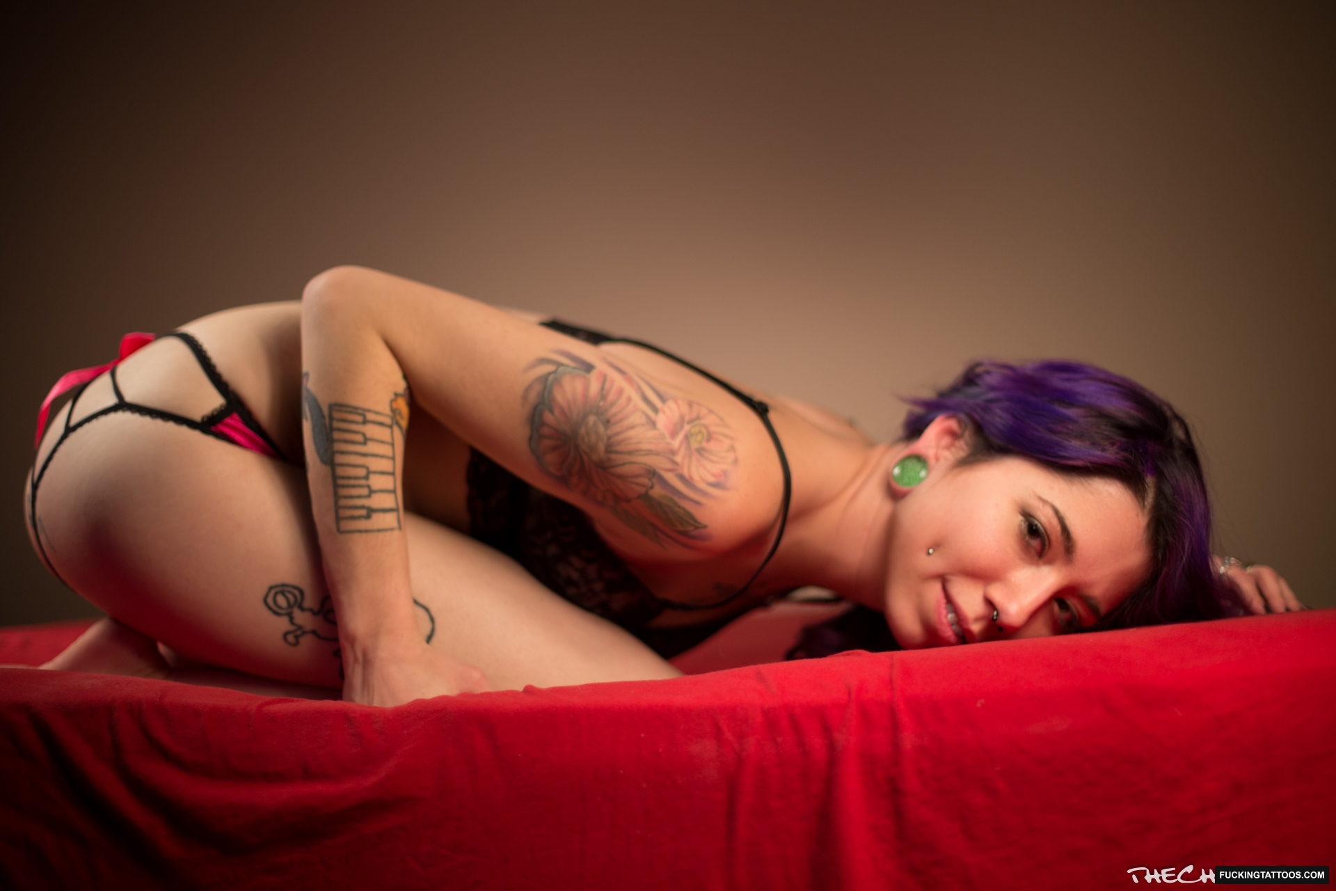 Tattooed Chick With Purple Hair…