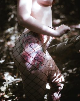 My Rose Tattoo Peaking Through Fishnets